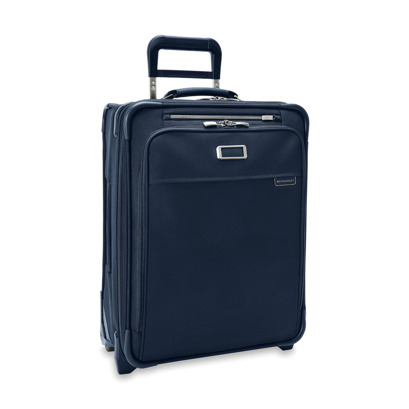 front of navy Briggs & Riley Baseline Global 2-Wheel Carry-On