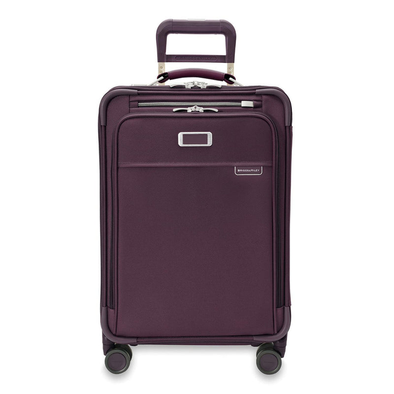 front of plum Briggs & Riley Baseline Essential Carry-On Spinner