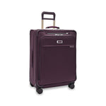 front of plum Briggs & Riley Baseline Medium Expandable Spinner