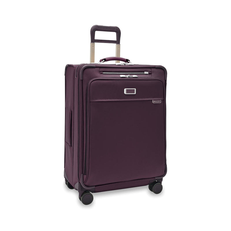 front of plum Briggs & Riley Baseline Medium Expandable Spinner