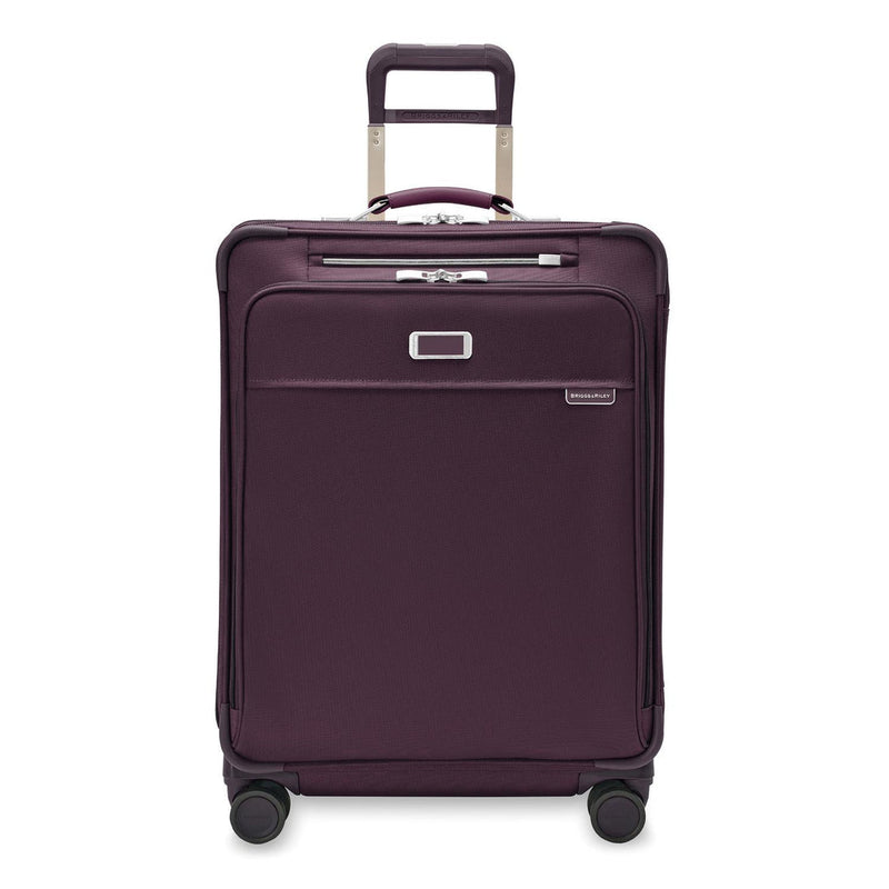 front of plum Briggs & Riley Baseline Medium Expandable Spinner
