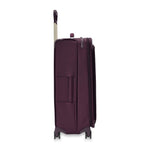 side of plum Briggs & Riley Baseline Large Expandable Spinner