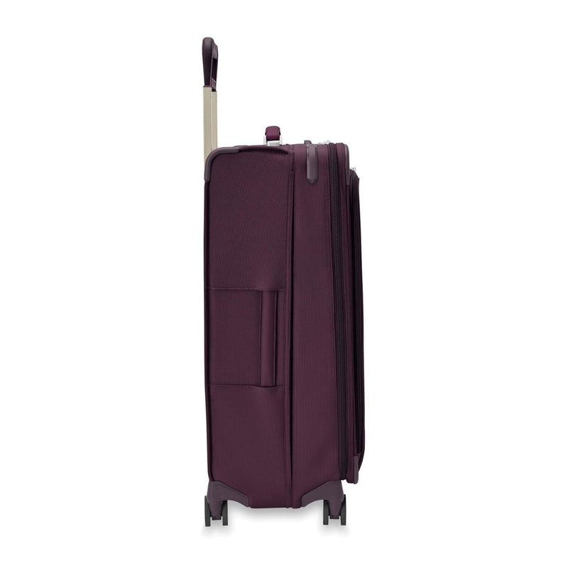 side of plum Briggs & Riley Baseline Large Expandable Spinner
