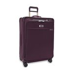 front of plum Briggs & Riley Baseline Large Expandable Spinner