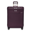 front of plum Briggs & Riley Baseline Large Expandable Spinner