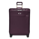 front of plum Briggs & Riley Baseline Large Expandable Spinner