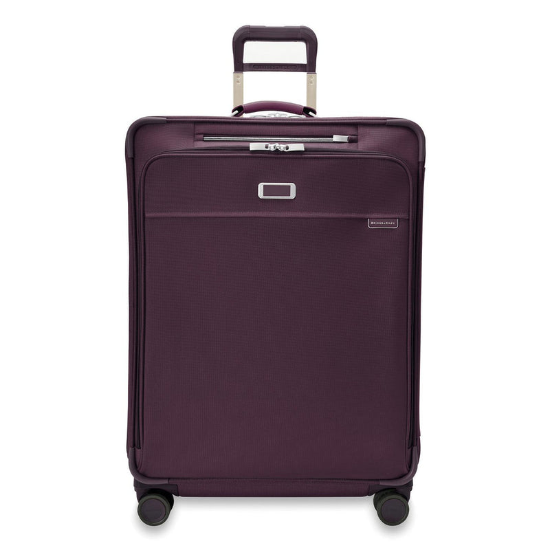 front of plum Briggs & Riley Baseline Large Expandable Spinner