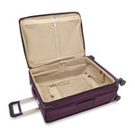 inside of plum Briggs & Riley Baseline Large Expandable Spinner