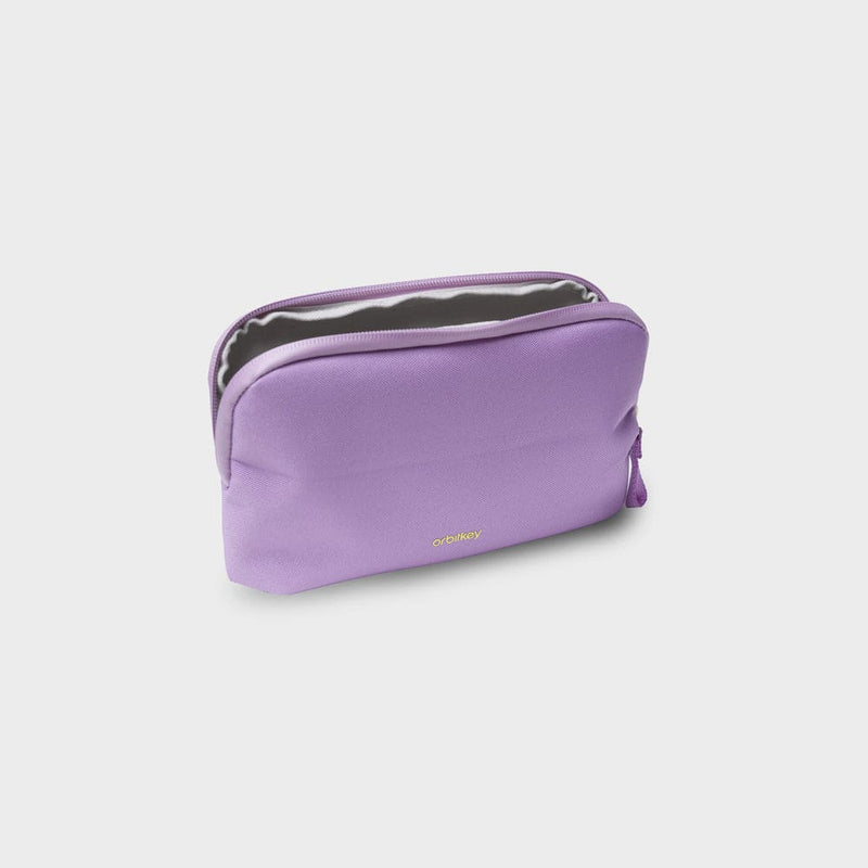 Purple orbitkey cosmetic bag with a zipper on a light gray background