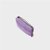 Purple orbitkey pouch with a zipper on a light gray background