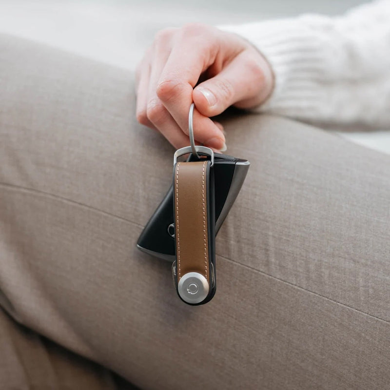 in hand acorn Orbitkey Hybrid Leather Key Organizer