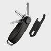 orbitkey multi-tool keychain with leather case and attached tool on a light gray background