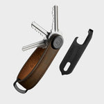 orbitkey multitool with leather case and keyring on a light gray background