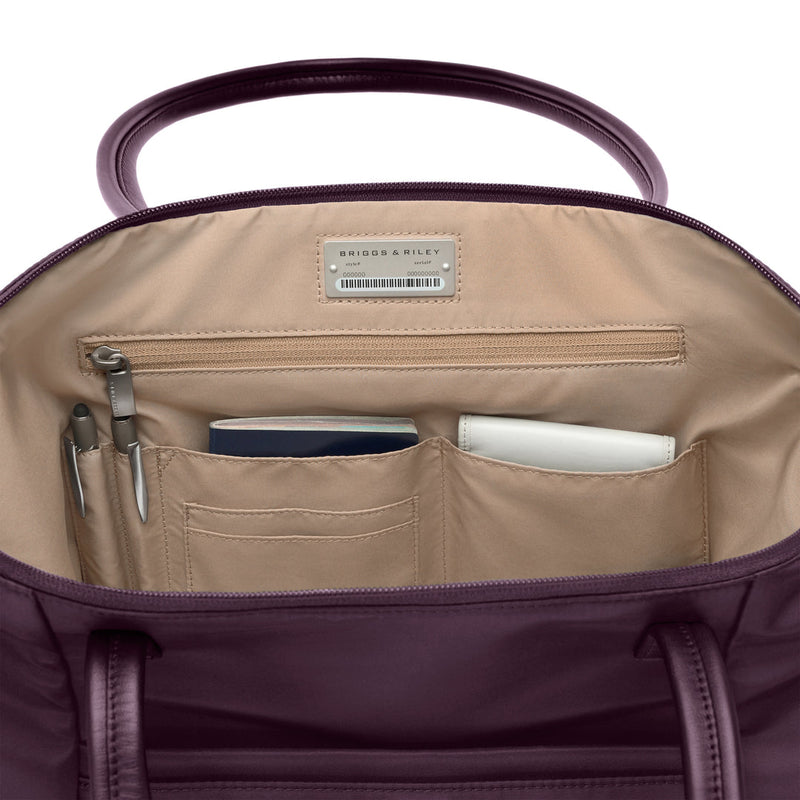 inside of plum Briggs & Riley Expandable Tote