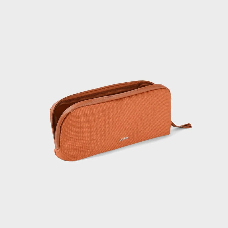 front of terracotta Orbitkey Pencil Case