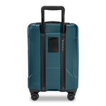 Ocean Briggs & Riley suitcase with black handle and wheels on a white background
