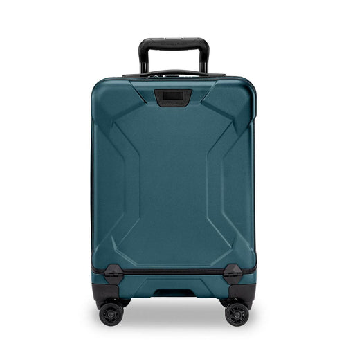 Ocean Briggs & Riley suitcase with black accents on a white background