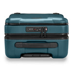 Ocean Briggs & Riley suitcase with black handle and zipper on a white background