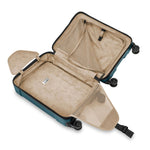Open Briggs & Riley suitcase with ocean exterior and beige interior on a white background