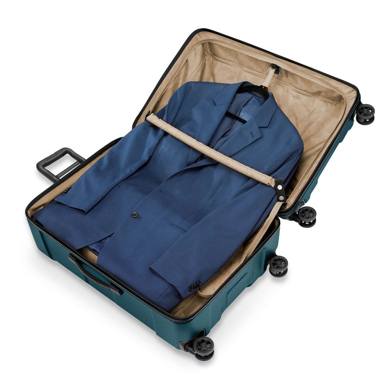 ocean Briggs & Riley suitcase with a suit inside
