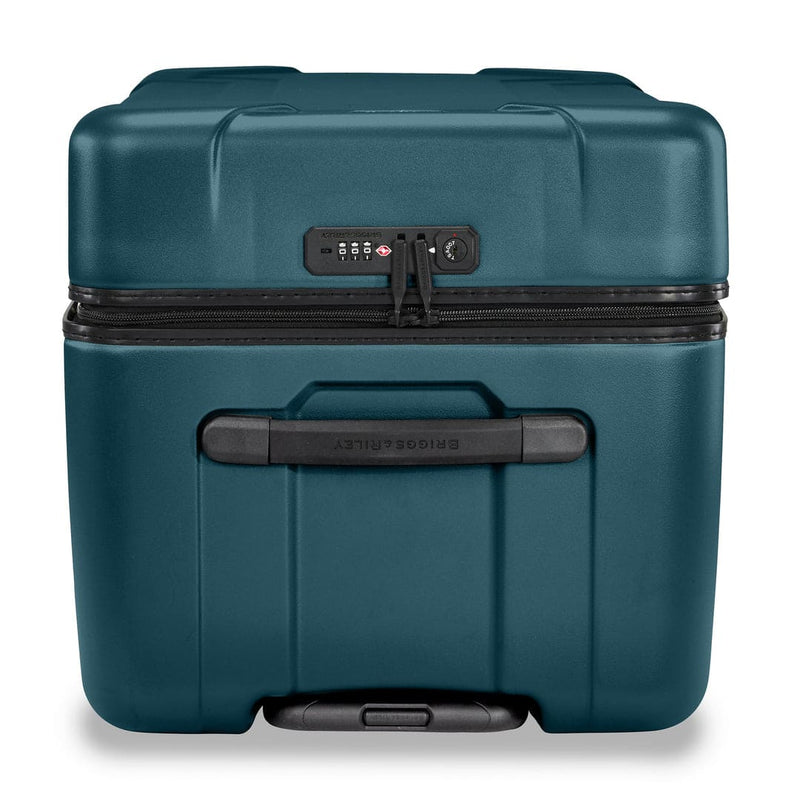 Ocean Briggs & Riley suitcase with black handle and zipper on a white background