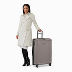 model with latte Briggs & Riley Sympatico Large Expandable Spinner