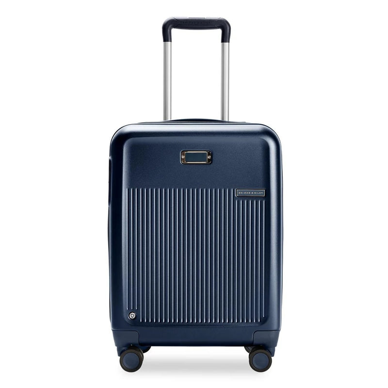 front of navy Briggs & Riley Sympatico Global Carry-On Spinner