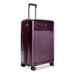 front of plum Briggs & Riley Sympatico Large Expandable Spinner