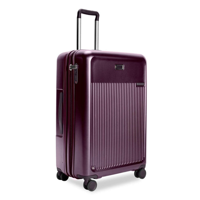 front of plum Briggs & Riley Sympatico Large Expandable Spinner