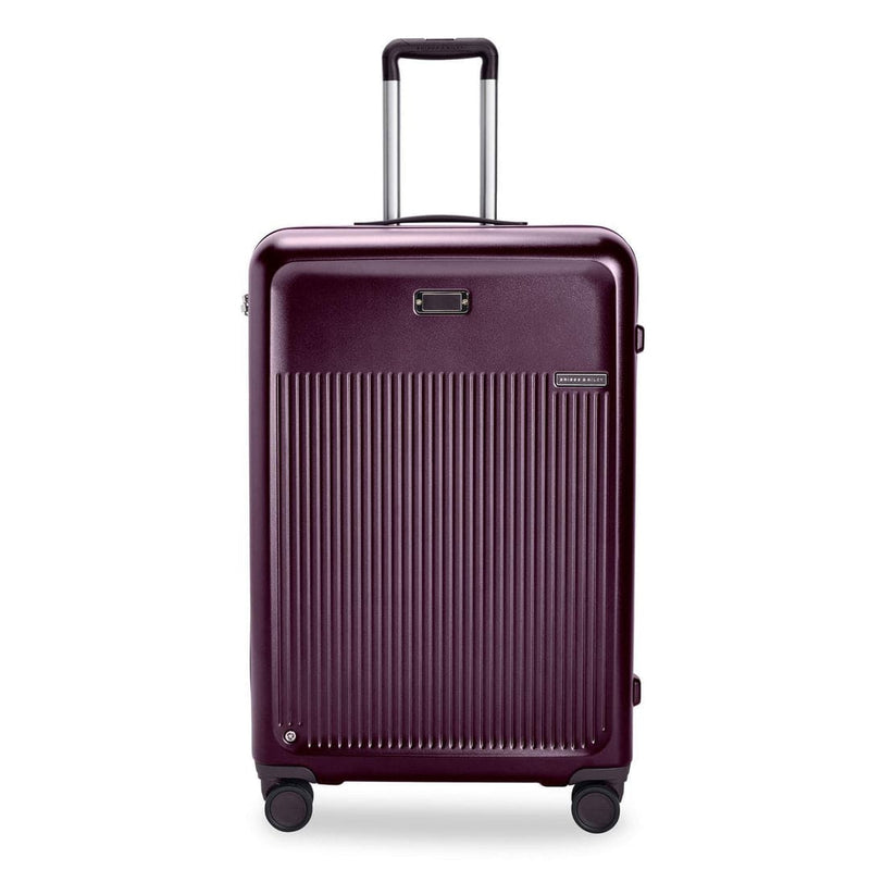 front of plum Briggs & Riley Sympatico Large Expandable Spinner