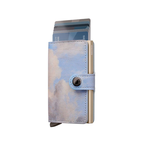 Cloud-patterned Secrid wallet on a white background