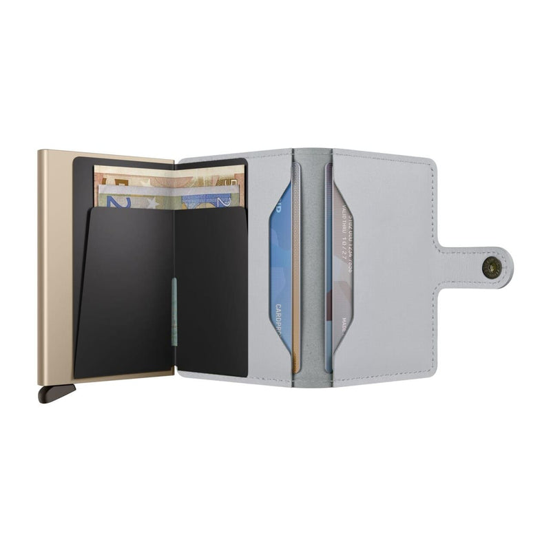 Open Secrid wallet displaying card slots and cash compartment on a white background
