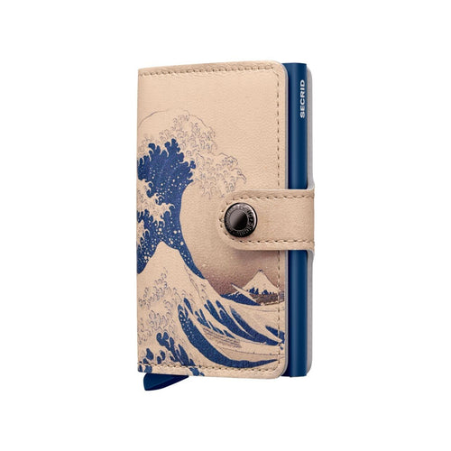 Beige cardholder with blue wave design and 'Secrid' branding on a white background
