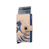 Beige Secrid wallet with wave design and blue accents on a white background