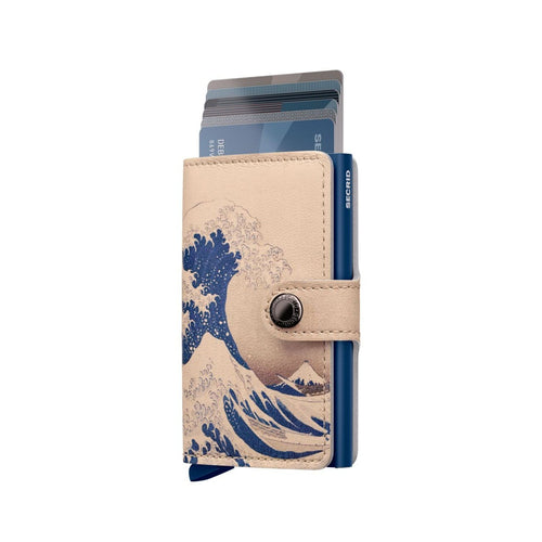Beige Secrid wallet with wave design and blue accents on a white background