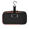 Black Briggs & Riley toiletry bag with brown trim and a hanging hook on a white background