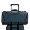 Blue Briggs & Riley duffel bag with black accents on a white background