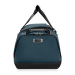 Blue Briggs & Riley duffel bag with black handle and trim on a white background