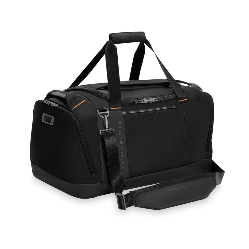 Black Briggs & Riley travel duffel bag with shoulder strap on a white background
