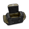 Open black Briggs & Riley duffel bag on a white background
