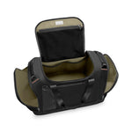 Open black Briggs & Riley duffel bag on a white background