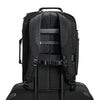 Black Briggs & Riley backpack with visible branding on a white background