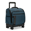 Blue Briggs & Riley rolling suitcase with black wheels and handle on a white background
