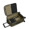 Open green Briggs & Riley suitcase with black interior on a white background