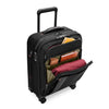 Black Briggs & Riley suitcase with open compartment showing packed clothes on a white background