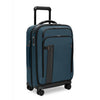 Blue Briggs & Riley suitcase with black handle and wheels on a white background