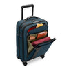 Blue Briggs & Riley  suitcase with open compartment showing various items on a white background