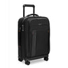 Black Briggs & Riley suitcase with wheels and handle on a white background