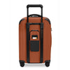 Orange Briggs & Riley suitcase with black handle and wheels on a white background