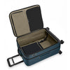 open Blue Briggs & Riley suitcase with black accents on white background
